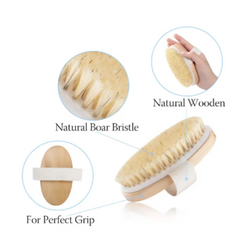 Oval bath brush with natural boar bristles, wooden base, and a white strap for a secure grip, designed for exfoliating and smoothing skin.