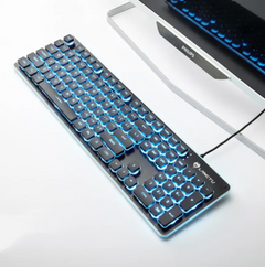 Black wired gaming keyboard with blue backlit keys connected to a desktop computer, designed for home and office use.