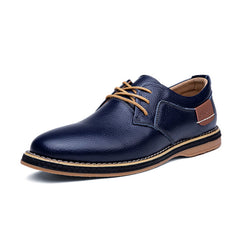 Navy blue genuine leather men's lace-up casual dress shoe with tan laces and detailed stitching, designed for comfort and style in business or casual settings.