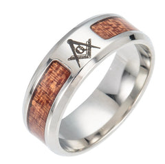 Close-up of a men's stainless steel ring featuring wood inlays and an engraved Masonic symbol, designed for a stylish and meaningful accessory.