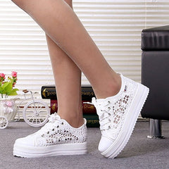 Close-up of the textured non-slip rubber sole and mesh-inspired detailing on white Xia Daddy shoes