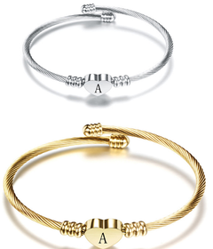 Two elegant textured cable bracelets, one in silver and one in gold, each featuring a personalized heart charm engraved with the initial "A".