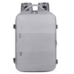 Light gray large travel backpack designed for women with a sleek, minimalist exterior featuring multiple zippered compartments, padded shoulder straps, and side adjustment buckles.