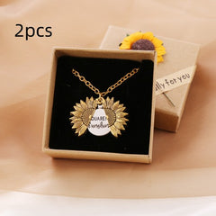 Gold sunflower locket necklace with a hidden message inside, displayed in a gift box decorated with a small sunflower and a "only for you" tag, ideal for heartfelt gifts.