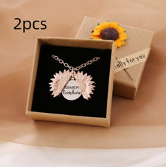Sunflower locket necklace with a hidden "You Are My Sunshine" message inside, presented in a gift box adorned with a decorative sunflower, perfect for sentimental gifting.