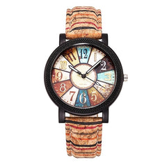 Vintage-inspired women's quartz watch featuring a multicolor dial with retro numerals and a textured leather strap, perfect for casual and boho styles.