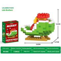 A detailed miniature Christmas-themed Santa Claus figure built with tiny green, white, red, and yellow building blocks, measuring approximately 5.6 cm wide and 5 cm tall.