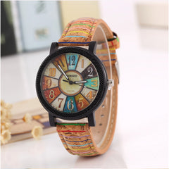 Vintage style women’s quartz watch featuring a multicolor dial and a textured retro leather strap, perfect as a heartfelt gift for stylish occasions.