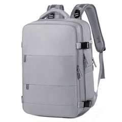 Light gray large travel backpack for women with multiple zippered compartments, padded shoulder straps, and side buckles, designed for convenient carry-on and laptop storage.