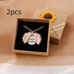 Sunflower locket necklace with hidden message "You Are My Sunshine" inside, displayed in a gift box with a sunflower decoration, perfect for heartfelt gifts.
