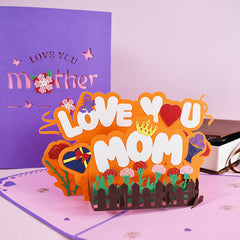 3D pop-up floral bouquet card with "Love You Mom" message, featuring colorful flowers, hearts, and a purple cover with "Love You Mother" text, perfect for Mother's Day.