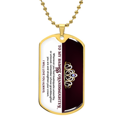 Gold-finished dog tag necklace featuring an engraved heartfelt message and a jeweled crown design, symbolizing love and strength for a granddaughter.
