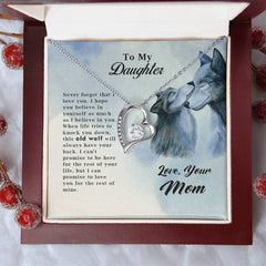 Silver heart-shaped Old Wolf - Forever Love Necklace with a sparkling crystal inside, displayed on a sentimental message card for a daughter from Mom with wolf illustrations.
