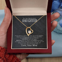 Forever Love Necklace, gold-tone heart pendant with diamond accent, inside a red jewelry box
