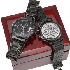 Charcoal black men's chronograph watch with engraved heartfelt message on the back, displayed on a polished wooden gift box, ideal for romantic or anniversary gifts.