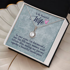 Elegant silver necklace with a sparkling cushion-cut crystal pendant displayed in a gift box featuring a heartfelt message for a wife.