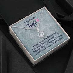 Elegant silver necklace with a sparkling cushion-cut cubic zirconia pendant displayed in a gift box featuring a heartfelt message for a wife.