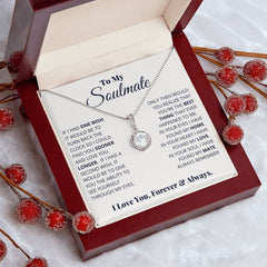 Elegant silver necklace with a sparkling cushion cut cubic zirconia pendant displayed in a polished wooden gift box alongside a heartfelt message inside the lid.