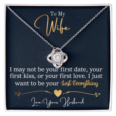 To My Last Everything Love Knot Necklace; silver-tone pendant with clear crystals on a chain in navy gift box