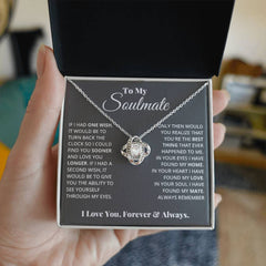 Jewelry: To My Soulmate Love Knot Necklace with a silver chain and crystal pendant by ShineOn Fulfillment.