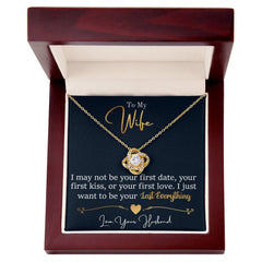 To My Last Everything Love Knot Necklace with gold-tone pendant and chain, in burgundy jewelry box.