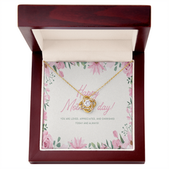 Heartfelt Mother's Day message card inside a jewelry gift box with a sparkling love knot pendant.