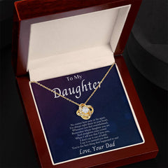 Im Always With You - Love Knot Necklacec displayed in an open wooden jewelry box with a heartfelt message to a daughter from her dad on a navy blue card background.