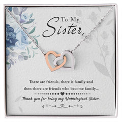 To My Sister Interlocking Hearts Necklace, two-tone rose gold and silver hearts on a silver chain in a gift box.