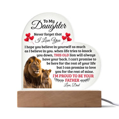 Heart-shaped acrylic plaque with a sentimental message from a father to his daughter, featuring a lion and cub image and a wooden light-up base.