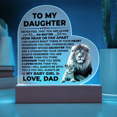LED acrylic heart plaque with a touching message from a father to his daughter, illuminated on a wooden base, featuring a lion and cub design.