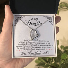 Silver heart-shaped necklace with sparkling crystals displayed in a gift box featuring a heartfelt message from a father to his daughter, expressing love and encouragement.