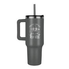 Matte gray stainless steel tumbler with handle and straw, laser-engraved with a heart, key, and lock design accompanied by the phrase "You've got the key to my heart.