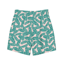 Men's board shorts with a teal tropical leaf pattern on a light pink background, featuring an elastic waistband for a comfortable fit.