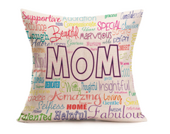 Decorative throw pillow featuring the word "MOM" surrounded by colorful positive adjectives and phrases on a soft fabric, ideal for Mother's Day gifts and home décor.