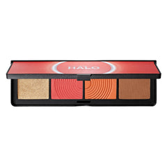Open face palette with coral and bronze contour, blush, and highlighter shades in a sleek black compact with a coral-colored lid labeled "HALO