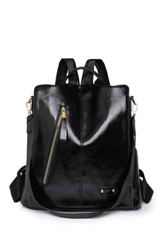Close-up of smooth-gliding zipper on Marcy vegan leather backpack