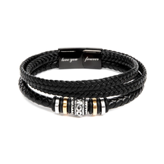 Black braided leather bracelet with silver and gold-tone decorative beads and an engraved magnetic clasp reading "love you forever," a personalized anniversary gift for him.
